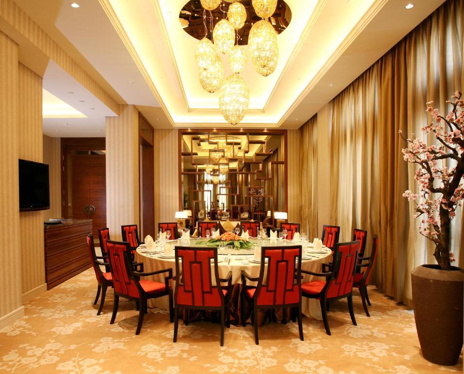 Landison Green Town Hotel Xinchang Exterior photo